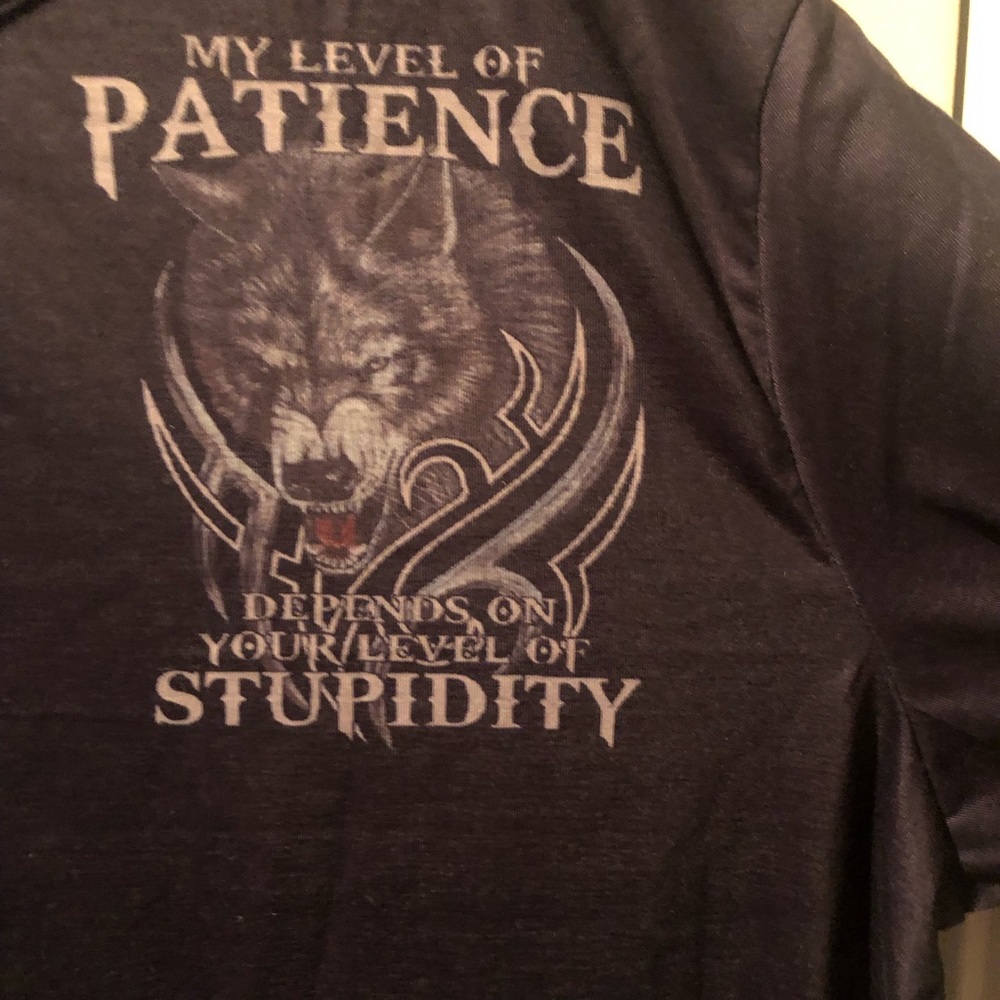 Black Tee Skulls  says My Level of Patience Depends on Your Level of Stupidly